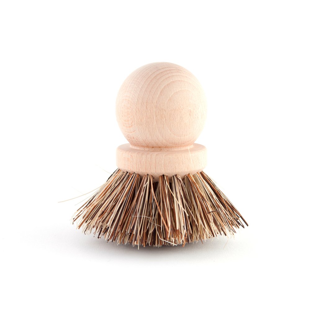 Wooden handle dish brush with natural bristles.