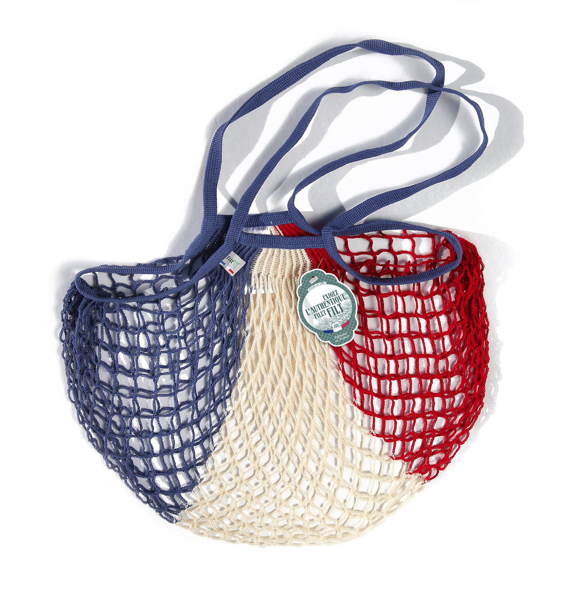 Red white and blue netted tote bag with hang tag reading Exigez l&