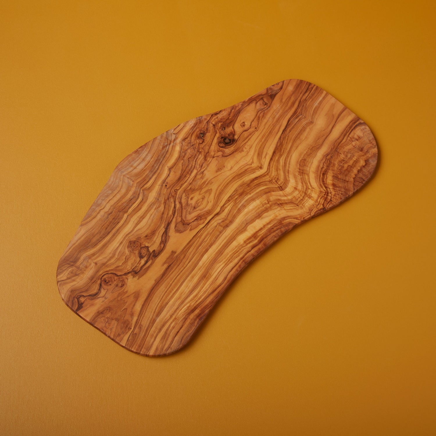 Rustic organic live edge olive wood cutting board tray