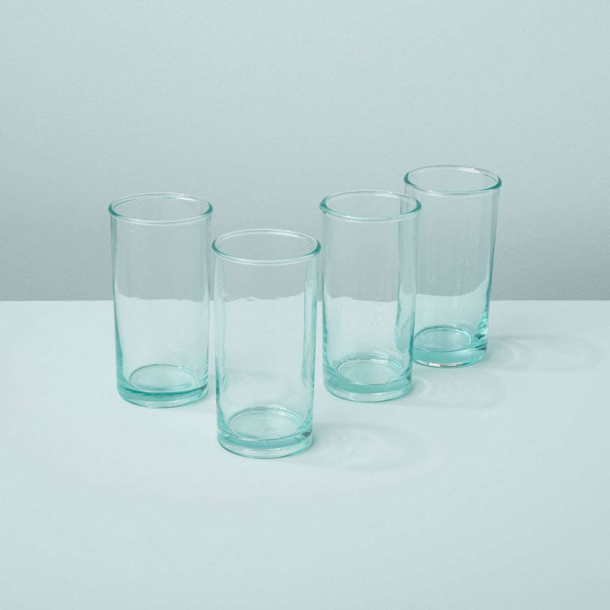 https://behome.com/cdn/shop/products/Be-Home_Recycled-Glass-Highball_46-35_acd78059-a7af-43f5-8679-be1ab9ffb4ac.jpg?v=1675213063&width=1500