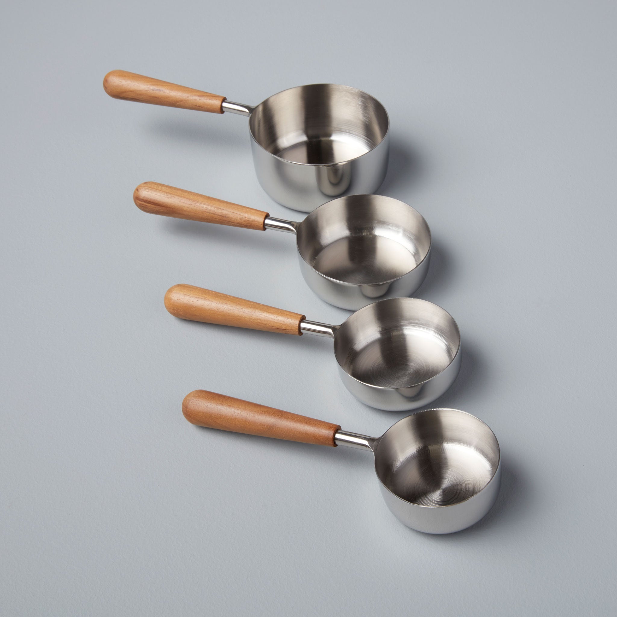 https://behome.com/cdn/shop/products/Be-Home_Teak-and-Stainless-Measuring-Cups-Set-of-4_25-19.jpg?v=1605658304&width=3840